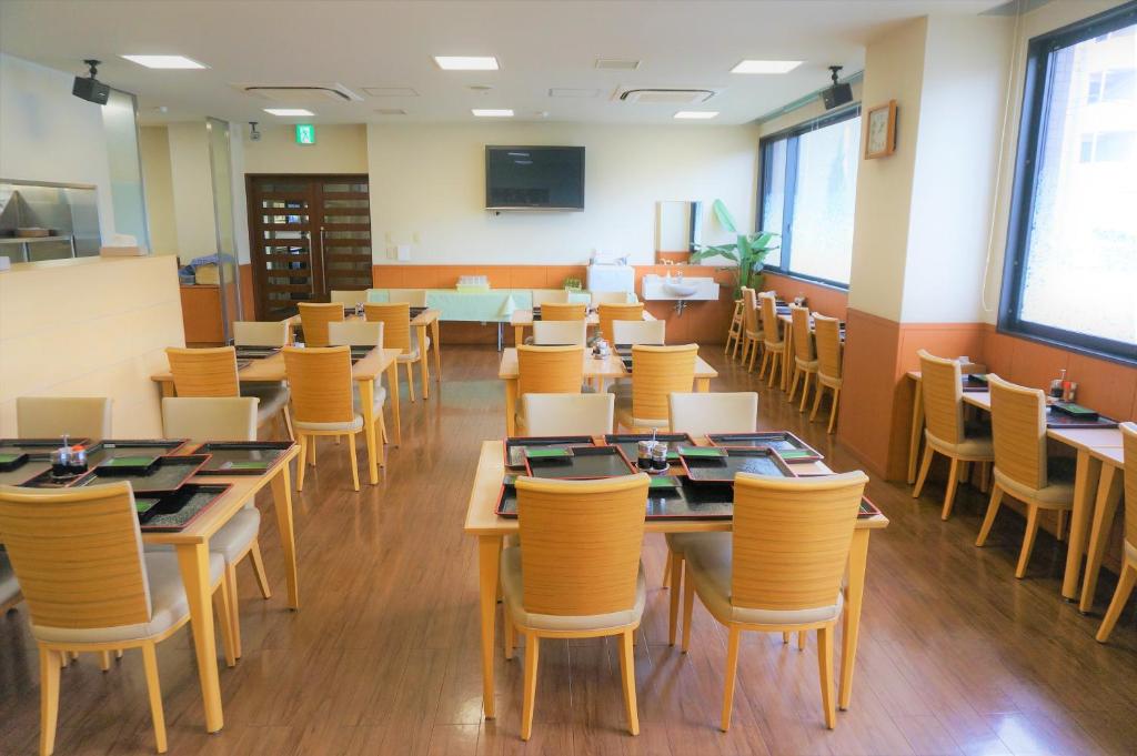 TV a/nebo společenská místnost v ubytování The Kato Hotel