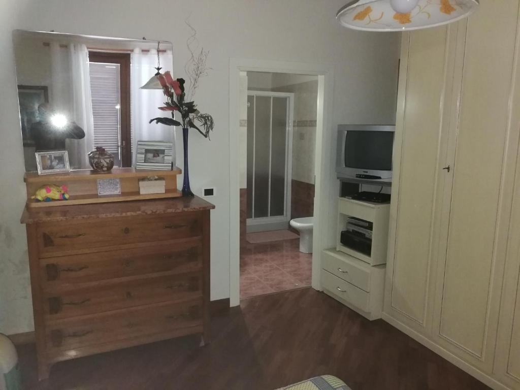 Telewizja i/lub zestaw kina domowego w obiekcie Vacanze Verde Mare - Beggi