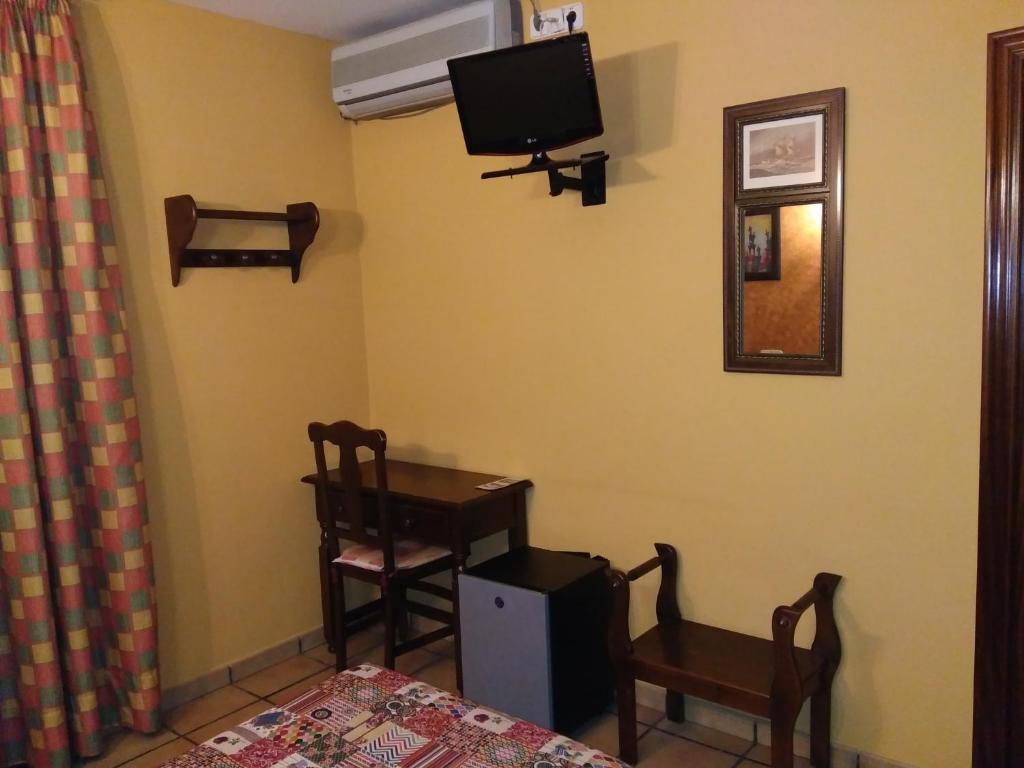 TV a/nebo společenská místnost v ubytování Hotel Riavela