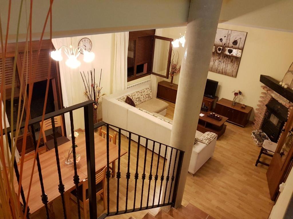 an aerial view of a living room with a couch at Casa Rural Claudia in Albarracín