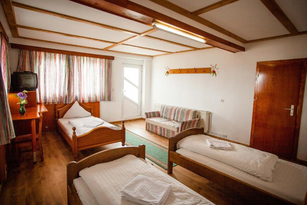 Postel nebo postele na pokoji v ubytování Casa Cerbului1