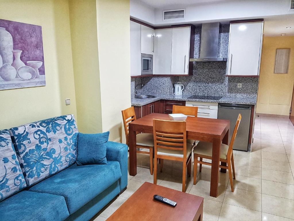 Kuchyň nebo kuchyňský kout v ubytování Apartamentos Doña Lucía