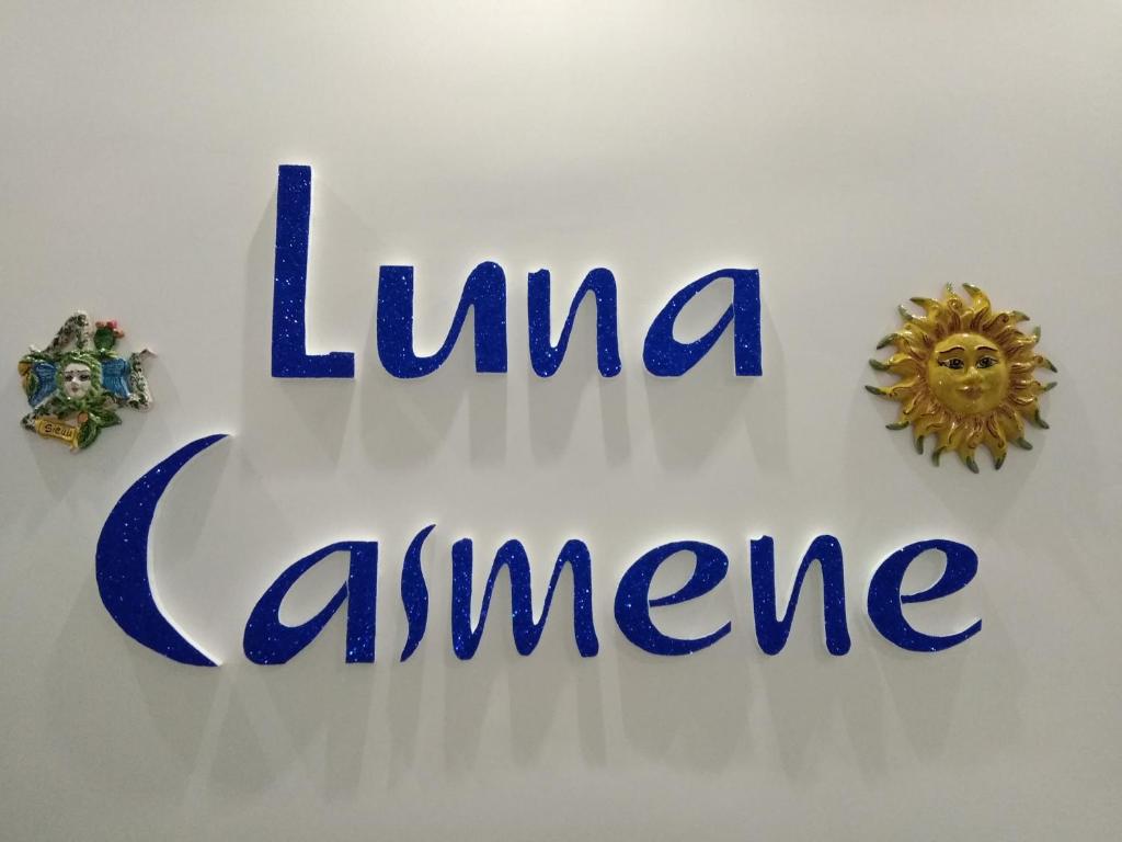 a sign that reads lima amnesia and a medal at Luna Casmene in Comiso