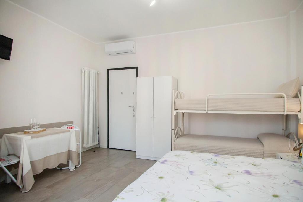 Postel nebo postele na pokoji v ubytování Cristel Apartment - 15 min da Milano