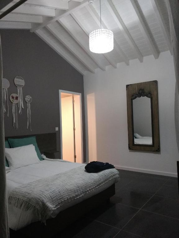 Postel nebo postele na pokoji v ubytování Quinta das Giestas