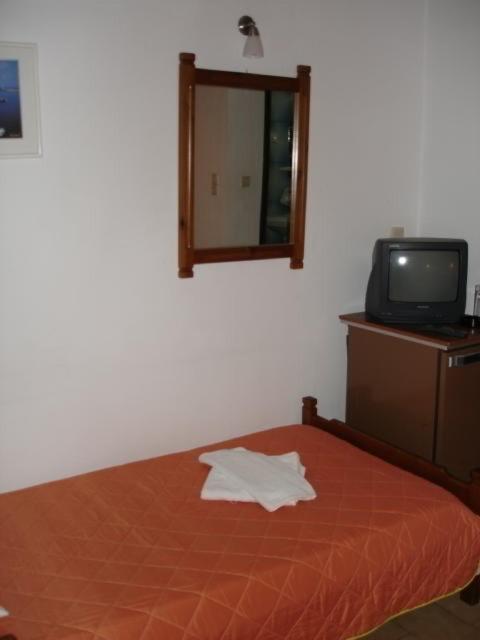 Postel nebo postele na pokoji v ubytování Elena Beach