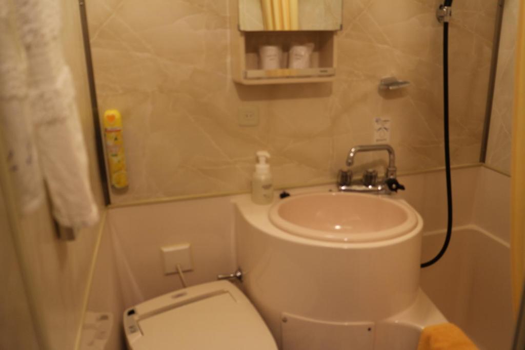 Koupelna v ubytování Hotel New Kotobuki