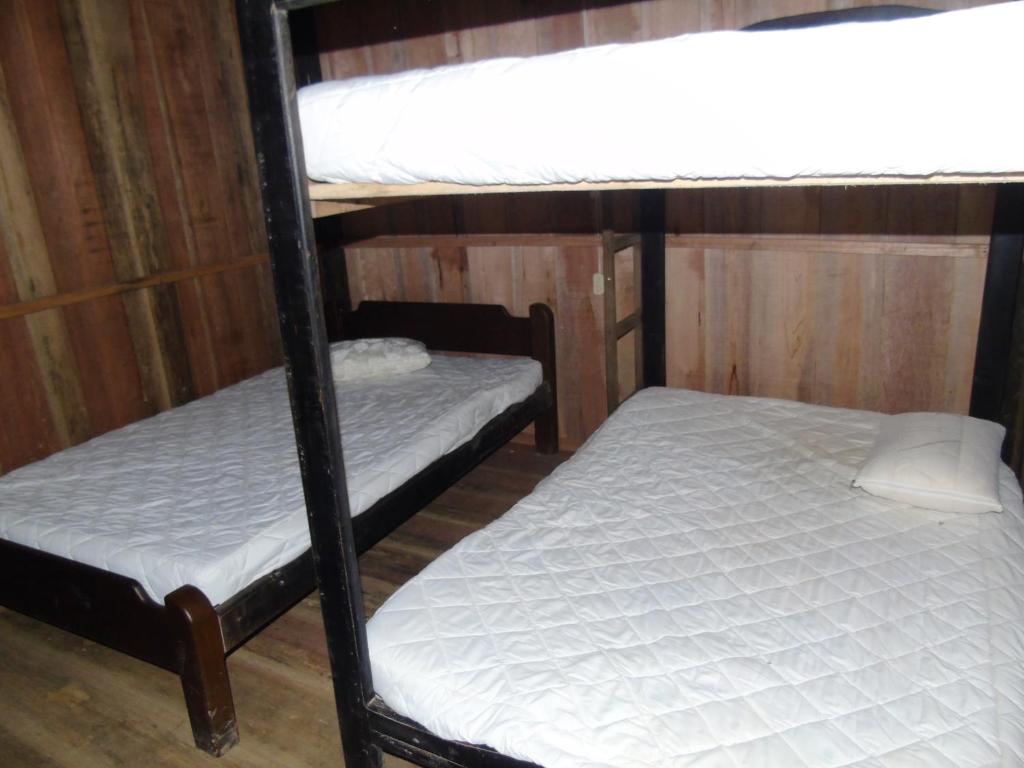 Postel nebo postele na pokoji v ubytování Posada Fin del Mundo