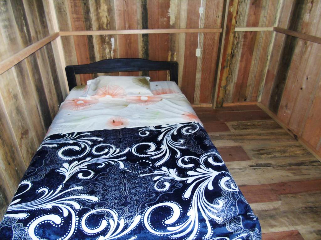 Postel nebo postele na pokoji v ubytování Posada Fin del Mundo