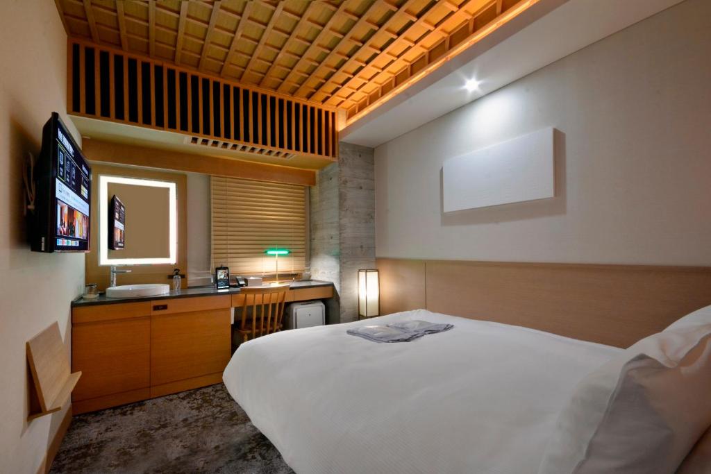 TV a/nebo společenská místnost v ubytování HOTEL HILLARYS Akasaka