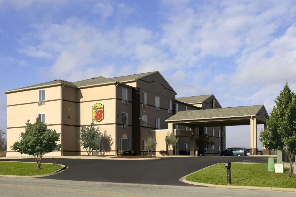 a rendering of a hotel with a parking lot at Super 8 by Wyndham Corydon in Corydon