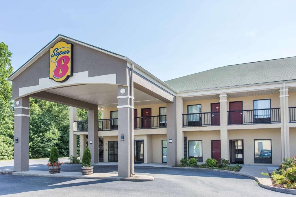 a hotel with the sign in front of it at Super 8 by Wyndham Petersburg in Petersburg