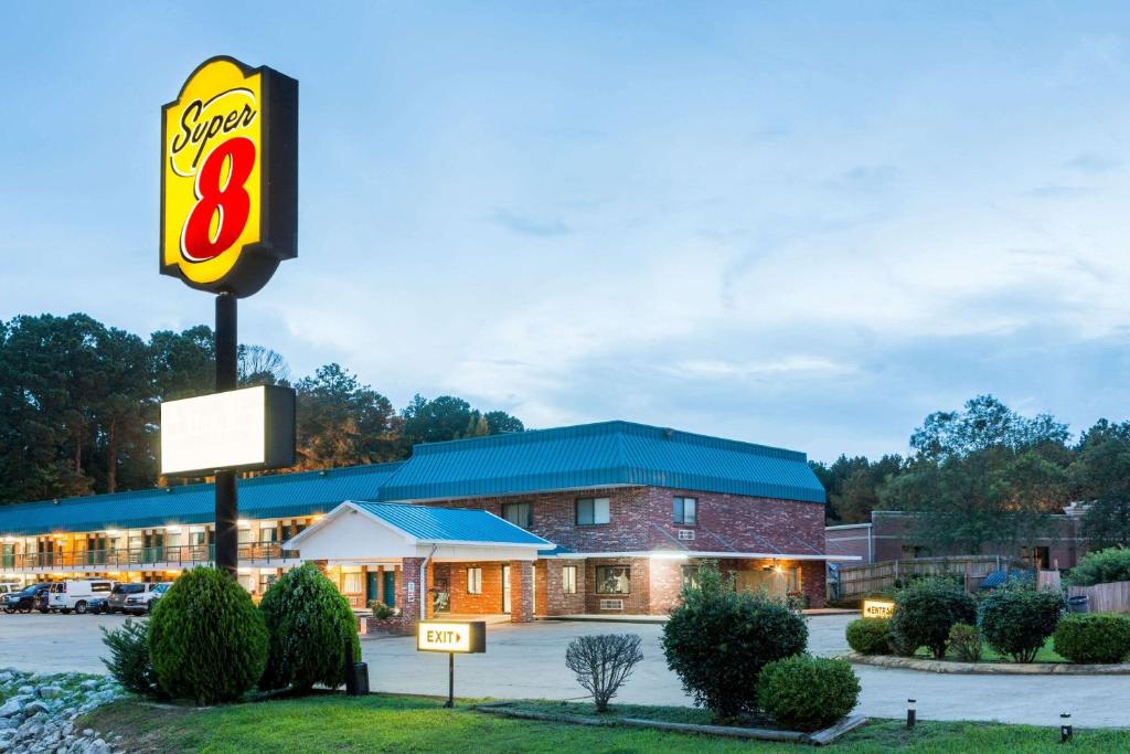 a fast food restaurant with a sign in front of it at Super 8 by Wyndham Kosciusko in Kosciusko