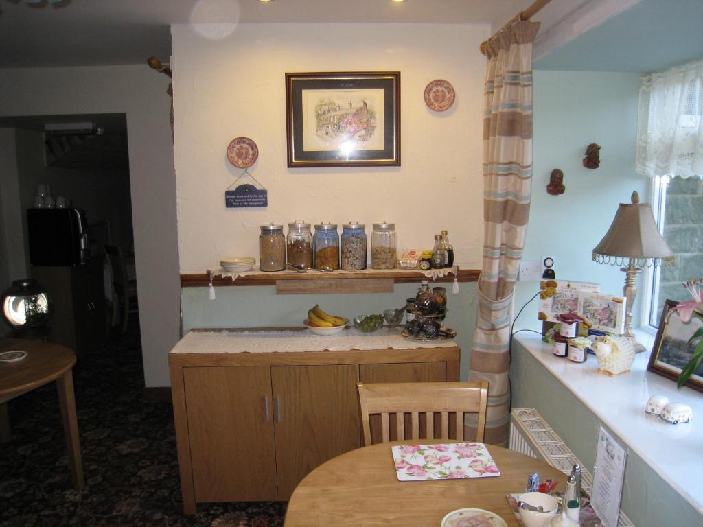 Kuchyň nebo kuchyňský kout v ubytování Rosebud Cottage Guest House