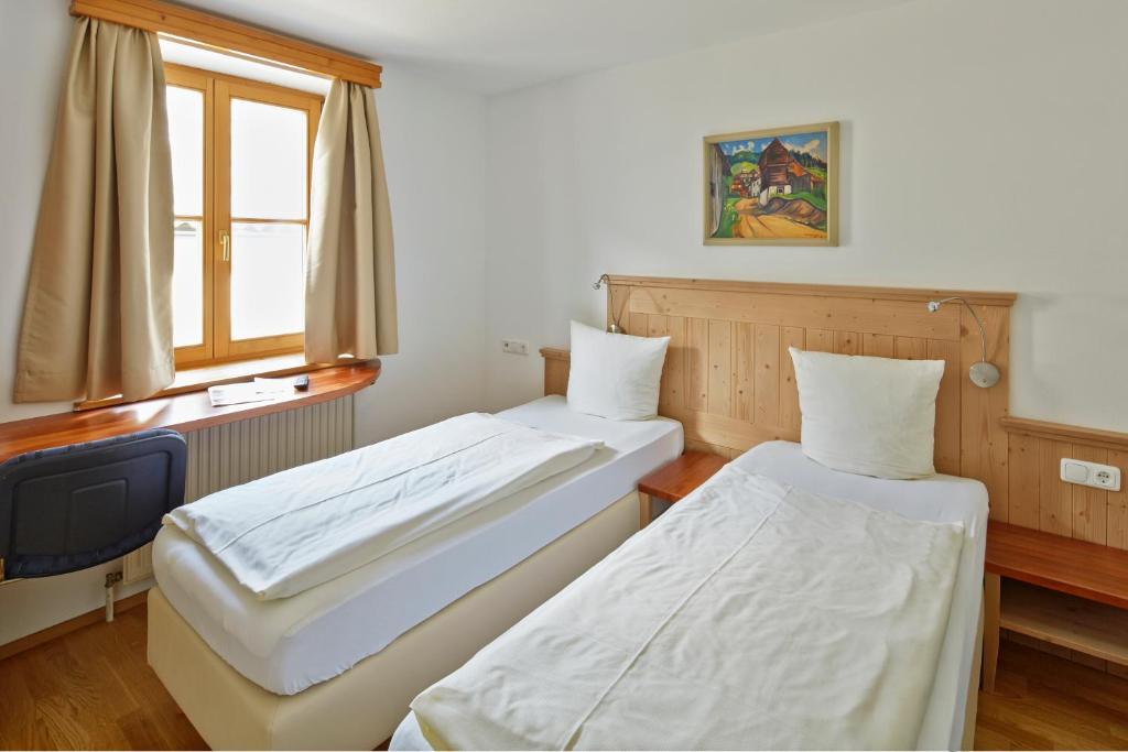 Posteľ alebo postele v izbe v ubytovaní Gasthof Hotel Schiffsmeisterhaus