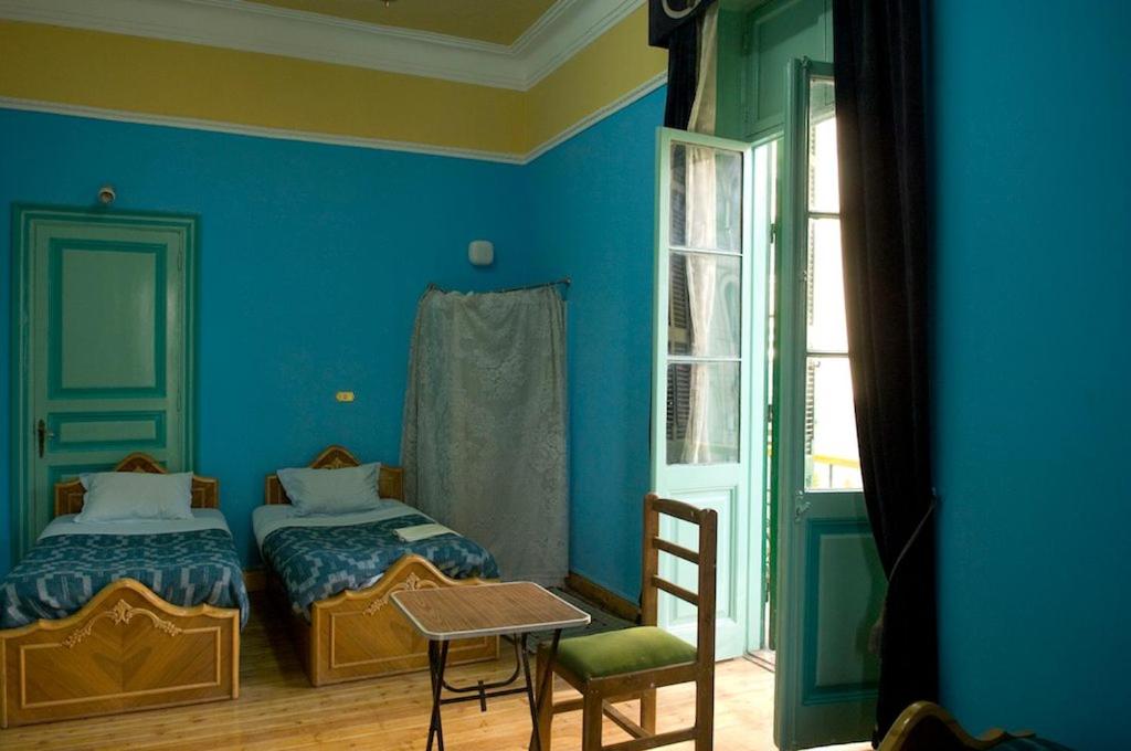 Postel nebo postele na pokoji v ubytování Berlin Hotel