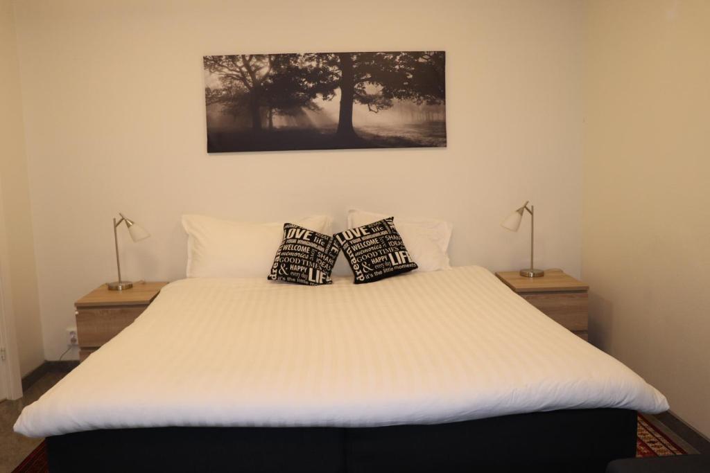 Postel nebo postele na pokoji v ubytování City HotelApartment