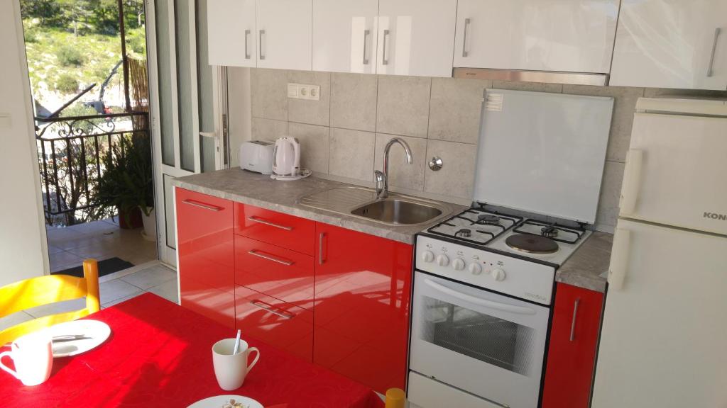 Kuchyň nebo kuchyňský kout v ubytování Rooms & Apartments Tepsa - Centre