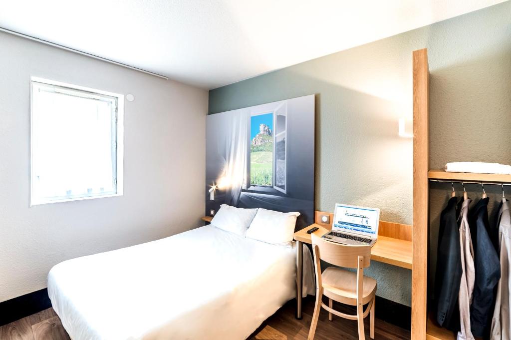 Ліжко або ліжка в номері B&B HOTEL Chalon-Sur-Saone Sud
