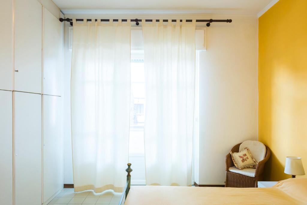 A bed or beds in a room at Casa Adriana