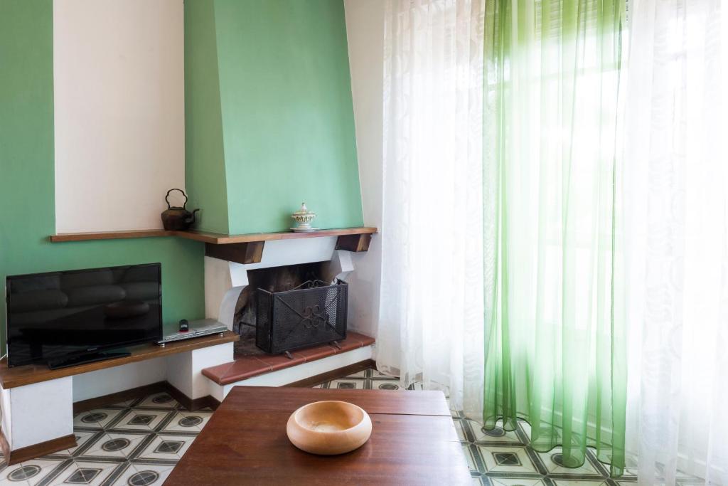 A television and/or entertainment centre at Casa Adriana