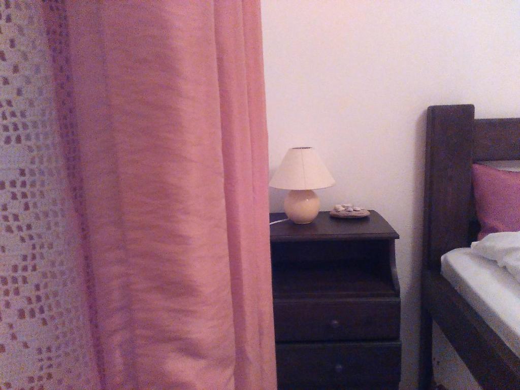 Postel nebo postele na pokoji v ubytování Maridatis Apartments