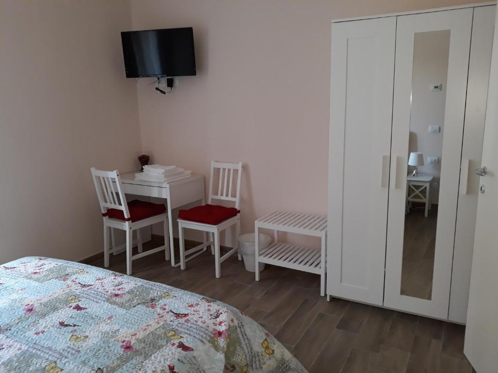A bed or beds in a room at El Doorado