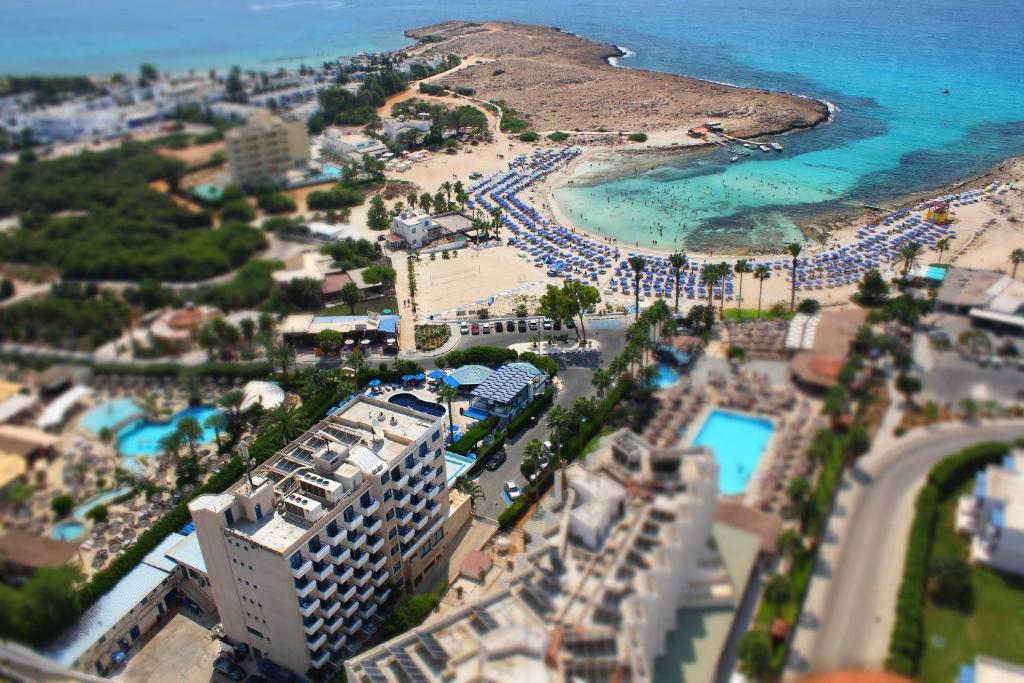 an aerial view of a beach and the ocean at Anonymous Beach Hotel (Adults 16+) in Ayia Napa