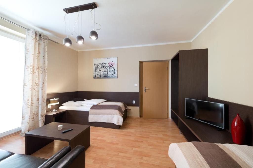 Postel nebo postele na pokoji v ubytování B2B Apartments