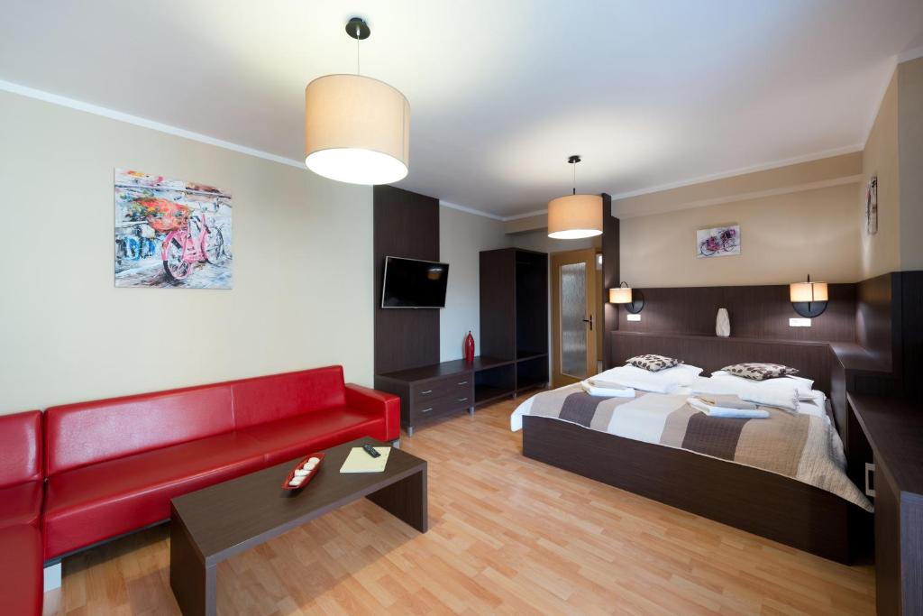 Postel nebo postele na pokoji v ubytování B2B Apartments