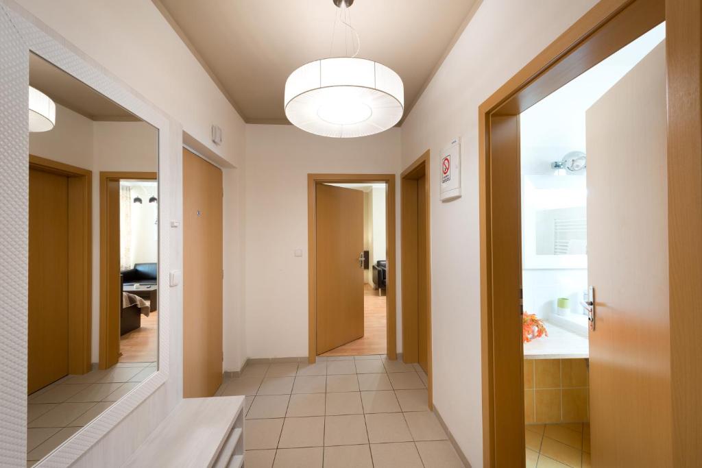 Postel nebo postele na pokoji v ubytování B2B Apartments