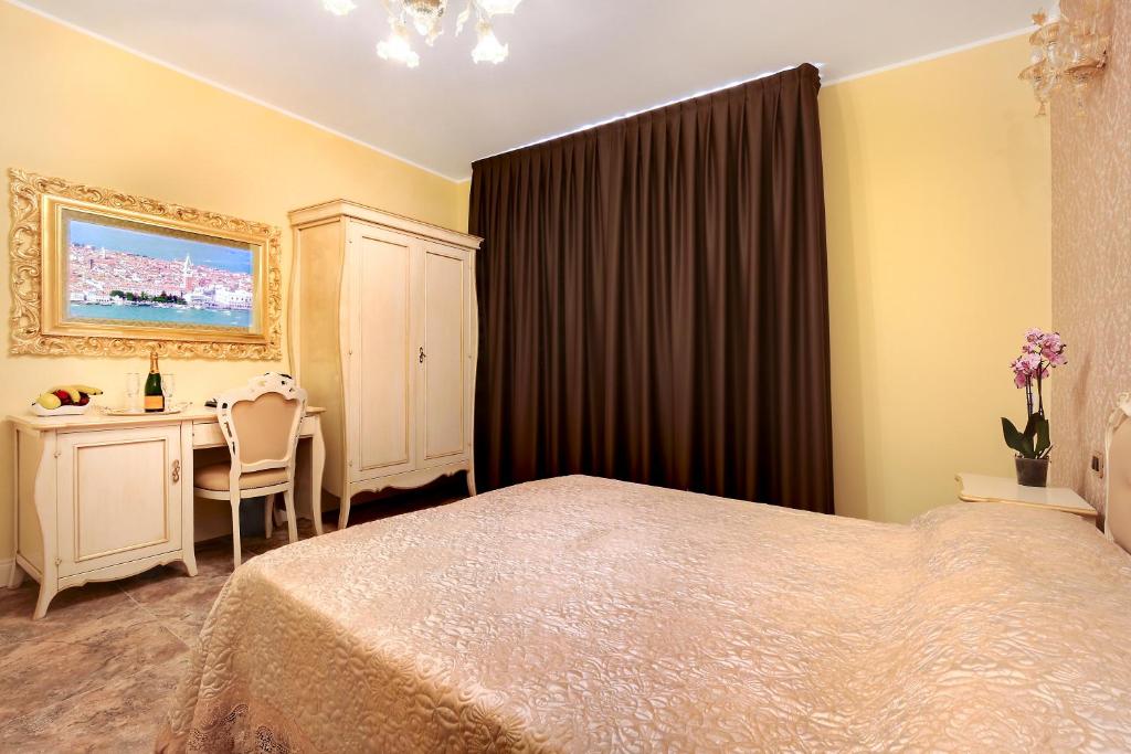 Postel nebo postele na pokoji v ubytování New Reiter Hotel