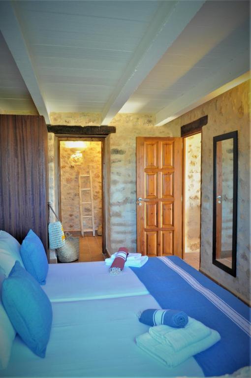 Postel nebo postele na pokoji v ubytování Siamoformentera Bella