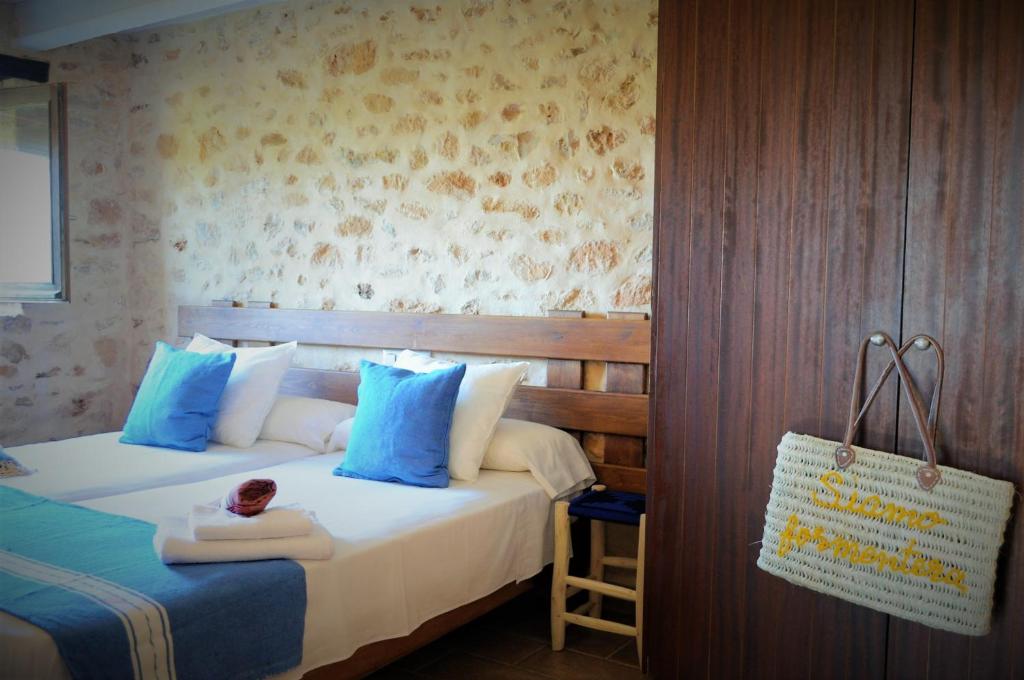 Postel nebo postele na pokoji v ubytování Siamoformentera Bella