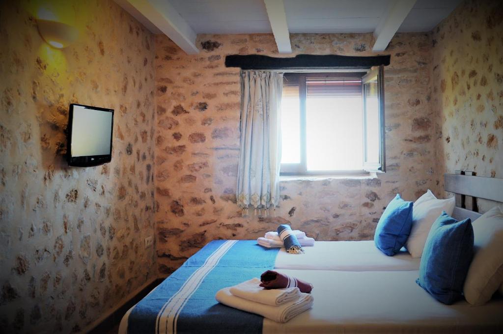 Postel nebo postele na pokoji v ubytování Siamoformentera Bella