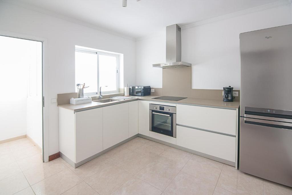Kuchyň nebo kuchyňský kout v ubytování Rooms & Suites Terrace 4C