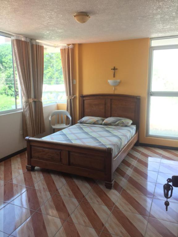 Postel nebo postele na pokoji v ubytování Hotel Kemarios