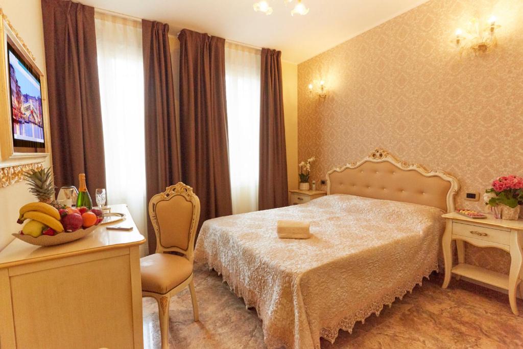 Postel nebo postele na pokoji v ubytování New Reiter Hotel