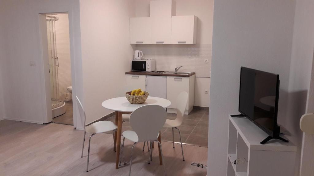 Kuchyňa alebo kuchynka v ubytovaní Apartment Sano