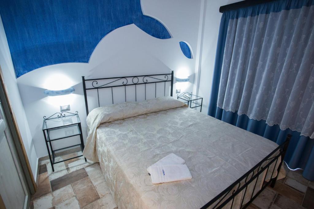Posteľ alebo postele v izbe v ubytovaní Coraje Room & Breakfast