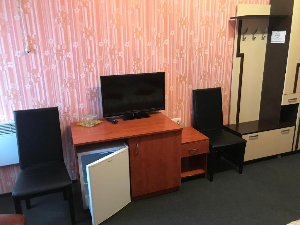 TV a/nebo společenská místnost v ubytování Domino