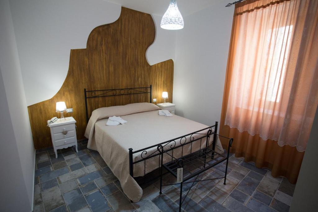 Posteľ alebo postele v izbe v ubytovaní Coraje Room & Breakfast