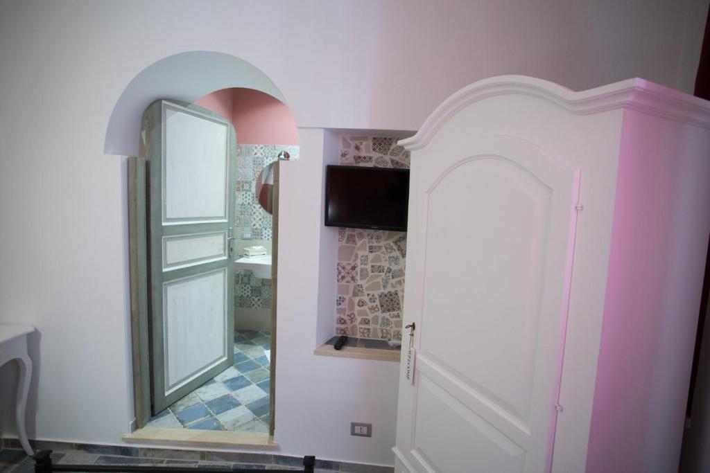 Posteľ alebo postele v izbe v ubytovaní Coraje Room & Breakfast