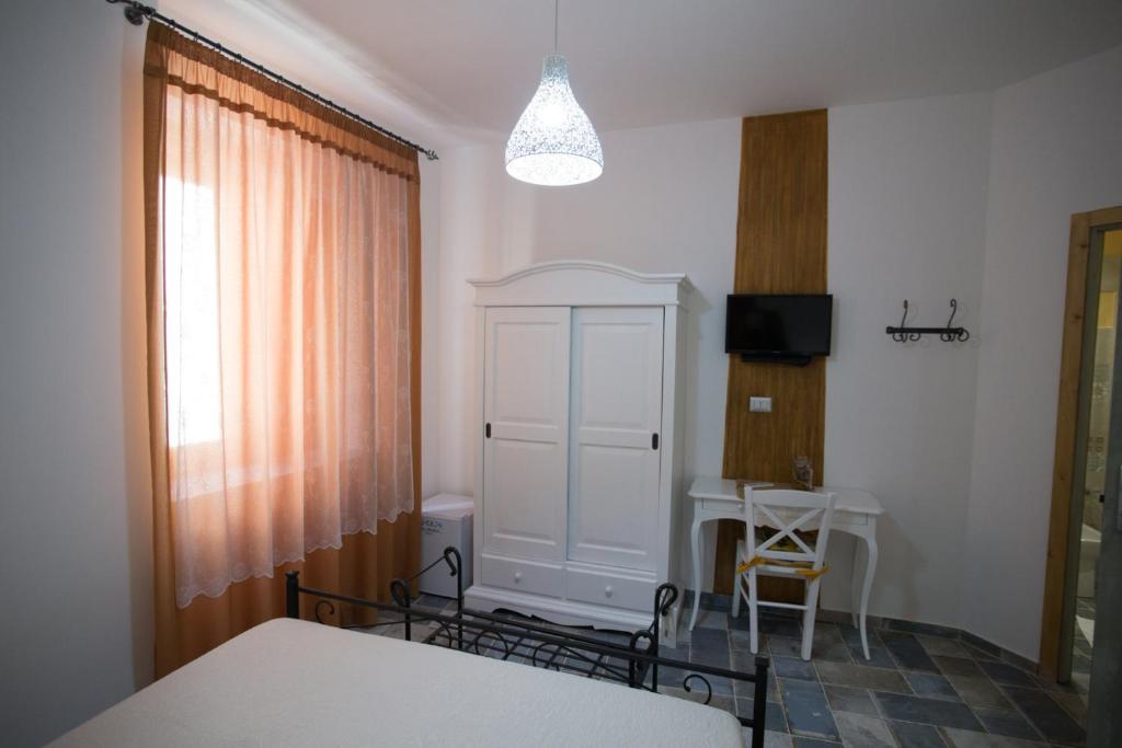 Posteľ alebo postele v izbe v ubytovaní Coraje Room & Breakfast