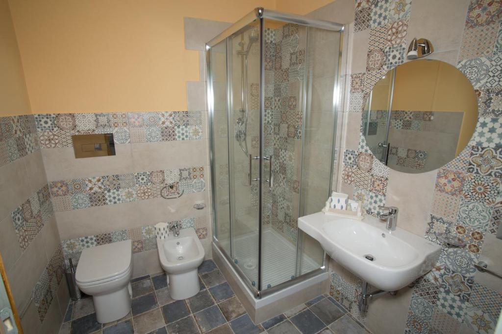 Kúpeľňa v ubytovaní Coraje Room & Breakfast