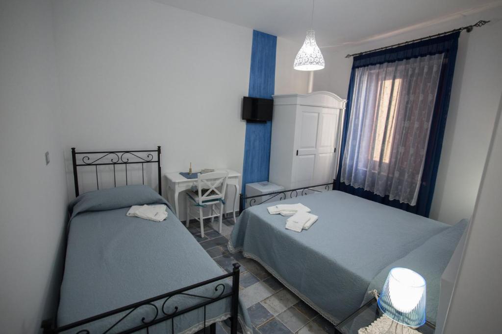 Posteľ alebo postele v izbe v ubytovaní Coraje Room & Breakfast