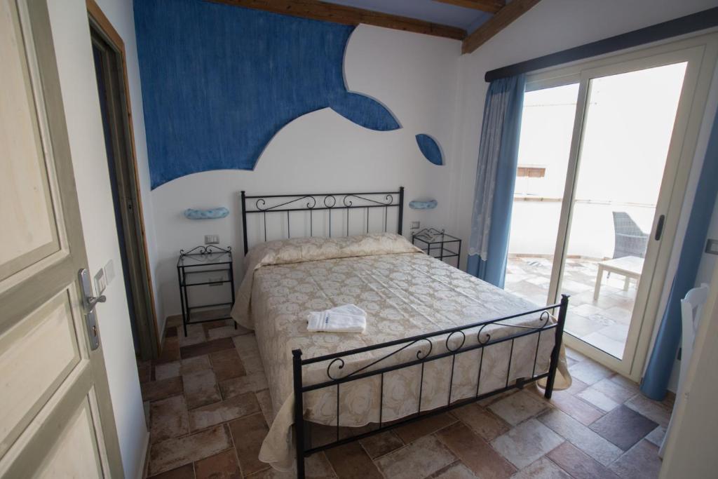 Posteľ alebo postele v izbe v ubytovaní Coraje Room & Breakfast