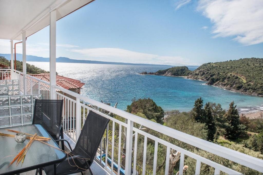 a balcony with a view of the ocean at Demi Studios in Ammouliani