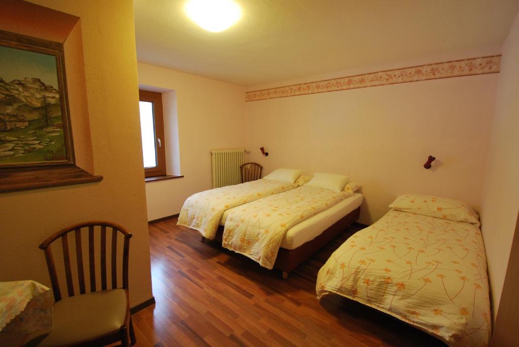 Postelja oz. postelje v sobi nastanitve Hotel Ristorante Baldi