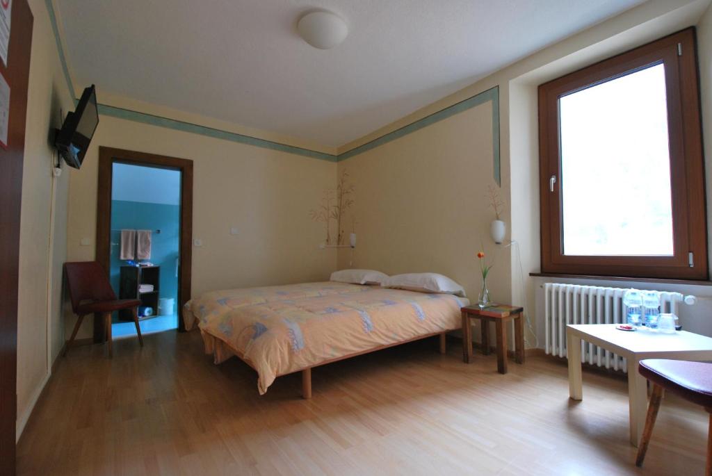 Postelja oz. postelje v sobi nastanitve Hotel Ristorante Baldi